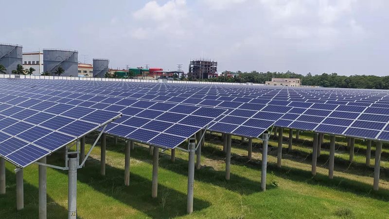 Elevated solar array over open ground at a grid-connected plant in Bangladesh
