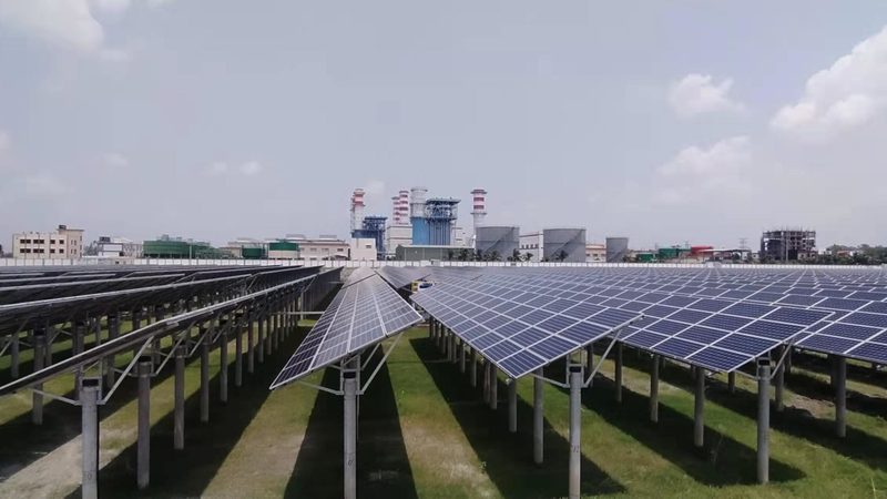 Rows of ground-mounted solar modules at a utility-scale solar plant in Bangladesh